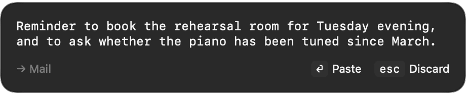 A finished transcript waiting for review, with Paste and Discard buttons